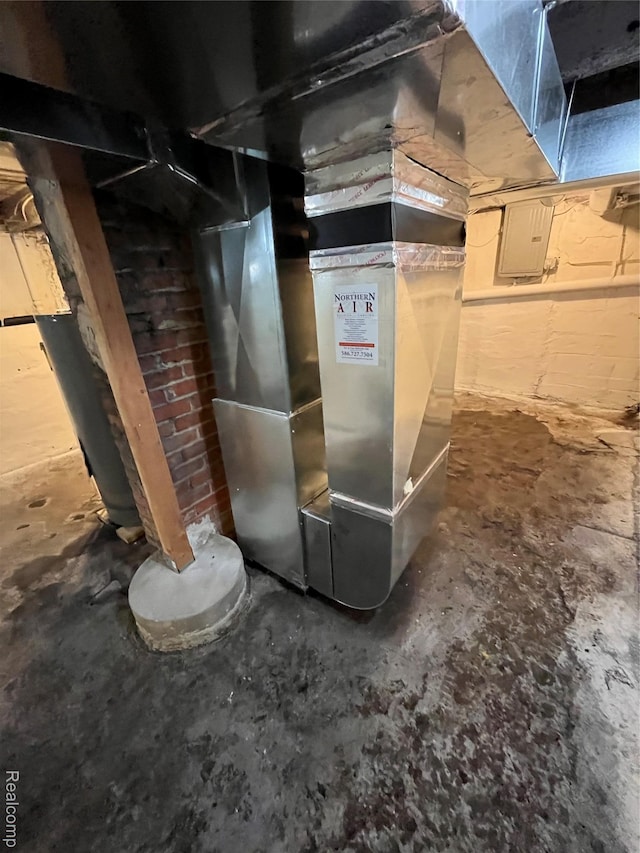 1015 9th St, Port Huron, MI 48060 - utility room featuring electric panel