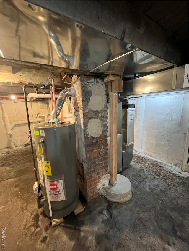 1015 9th St, Port Huron, MI 48060 - utility room featuring water heater and heating unit