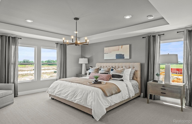 2724 Dunes Ct, Milford, MI 48381 - carpeted bedroom featuring a chandelier, baseboards, recessed lighting, and a tray ceiling