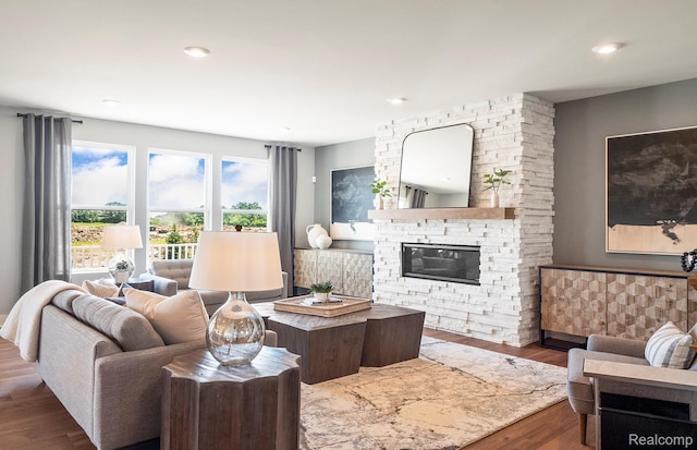 2724 Dunes Ct, Milford, MI 48381 - living room featuring wood finished floors, a fireplace, and recessed lighting