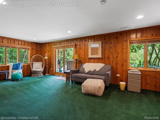 4383 Pine Tree Trl, Bloomfield Hills, MI 48302 - carpeted living room featuring wooden walls and recessed lighting