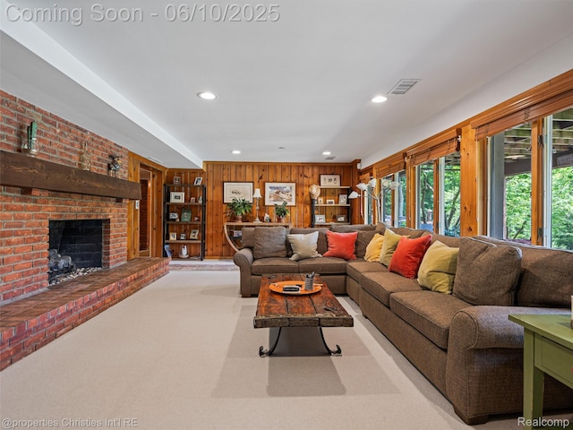 4383 Pine Tree Trl, Bloomfield Hills, MI 48302 - living area featuring wooden walls, recessed lighting, a fireplace, and carpet