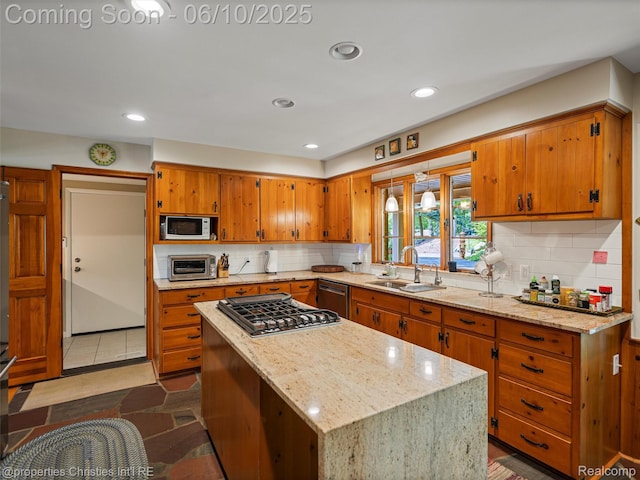 4383 Pine Tree Trl, Bloomfield Hills, MI 48302 - kitchen featuring a sink, stainless steel appliances, brown cabinetry, tasteful backsplash, and recessed lighting