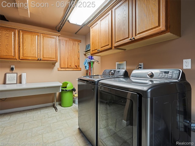4383 Pine Tree Trl, Bloomfield Hills, MI 48302 - laundry area featuring cabinet space, washing machine and clothes dryer, light stone finish floors, and baseboards