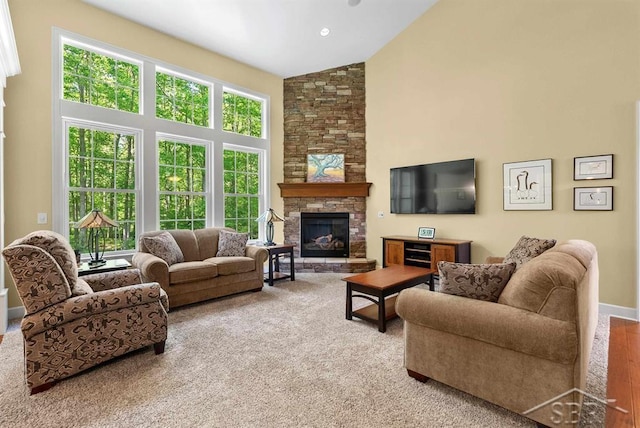 2887 E Iron Woods Pass, Midland, MI 48642 - living area featuring high vaulted ceiling, carpet, and a fireplace