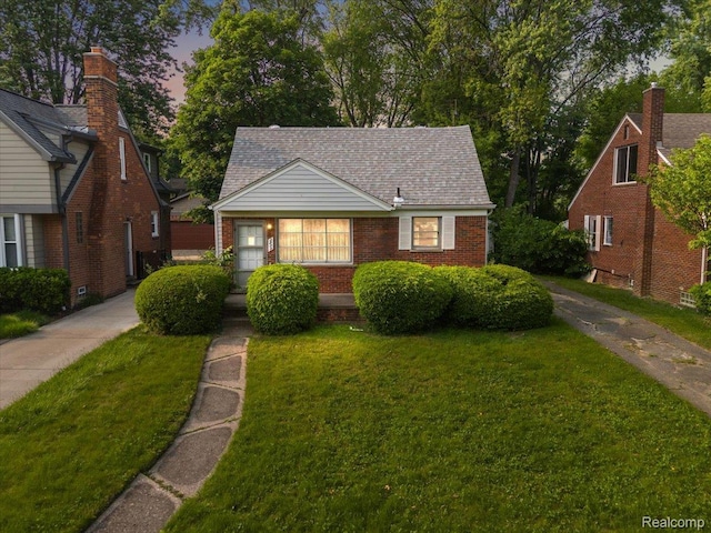 2829 Dorchester Rd, Birmingham, MI 48009 - view of front facade featuring a yard and brick siding