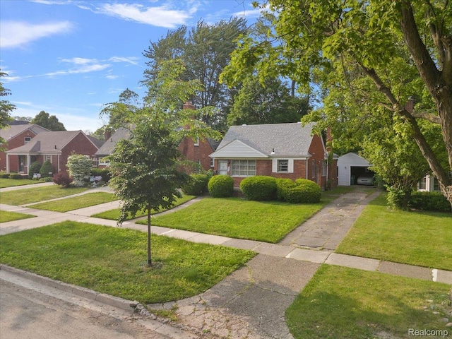 2829 Dorchester Rd, Birmingham, MI 48009 - view of front of house with driveway, a detached garage, a front yard, brick siding, and an outbuilding