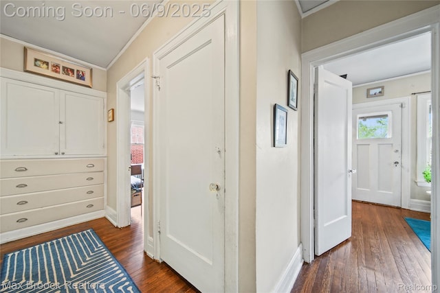 2444 Edison St, Detroit, MI 48206 - entrance foyer featuring crown molding, dark wood-style flooring, and baseboards