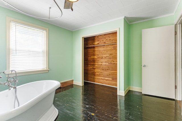 74219 Lambert Dr, South Haven, MI 49090 - full bathroom with a freestanding bath, crown molding, wood-type flooring, and baseboards