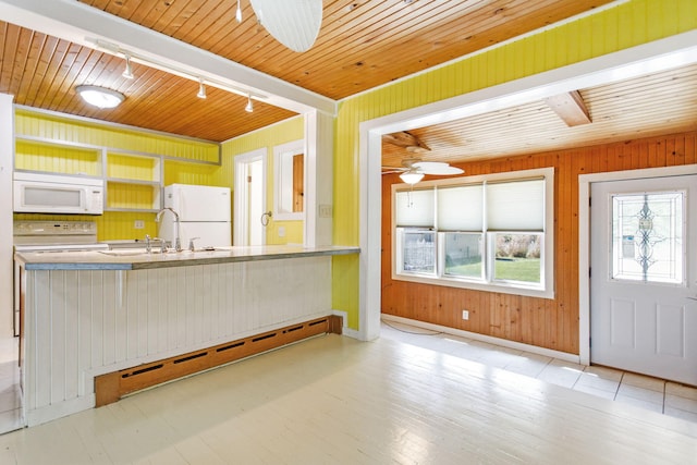 74219 Lambert Dr, South Haven, MI 49090 - kitchen featuring white appliances, a sink, baseboard heating, wood ceiling, and track lighting