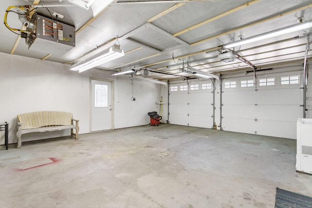 74219 Lambert Dr, South Haven, MI 49090 - garage featuring a garage door opener