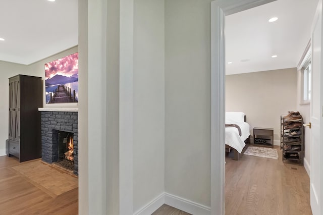 660 Sylvanwood Dr, Troy, MI 48085 - hallway featuring wood finished floors, baseboards, and recessed lighting
