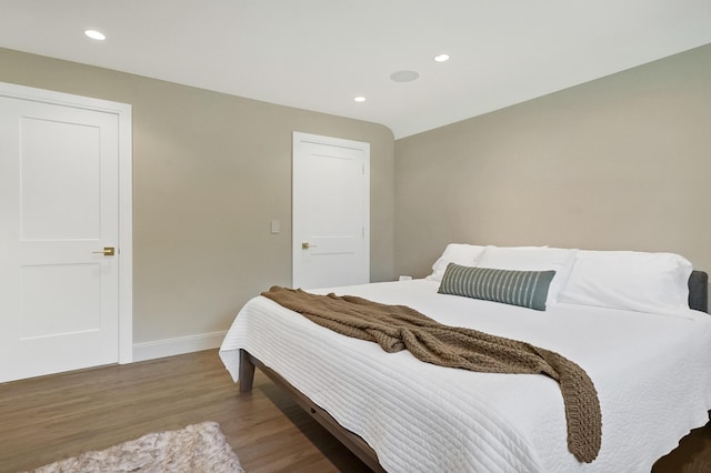 660 Sylvanwood Dr, Troy, MI 48085 - bedroom featuring wood finished floors, baseboards, and recessed lighting