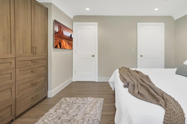 660 Sylvanwood Dr, Troy, MI 48085 - bedroom featuring baseboards, wood finished floors, and recessed lighting