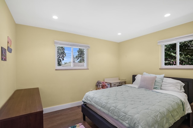 660 Sylvanwood Dr, Troy, MI 48085 - bedroom featuring multiple windows, wood finished floors, baseboards, and recessed lighting