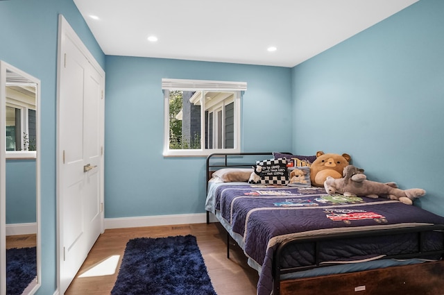 660 Sylvanwood Dr, Troy, MI 48085 - bedroom featuring baseboards, wood finished floors, and recessed lighting