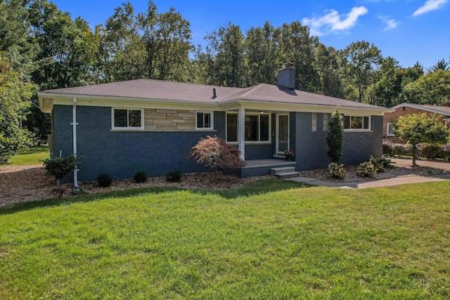 660 Sylvanwood Dr, Troy, MI 48085 - ranch-style home with a chimney, a front lawn, brick siding, and a porch
