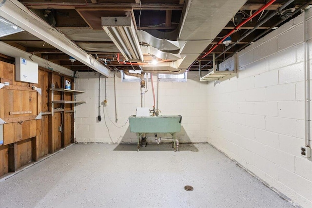 504 Alter Rd, Detroit, MI 48215 - unfinished basement with a sink and concrete block wall
