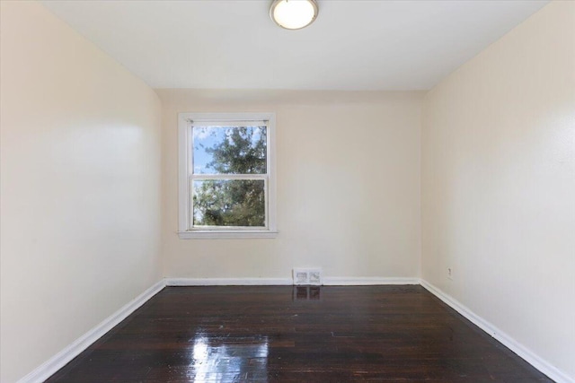504 Alter Rd, Detroit, MI 48215 - spare room featuring hardwood / wood-style floors and baseboards
