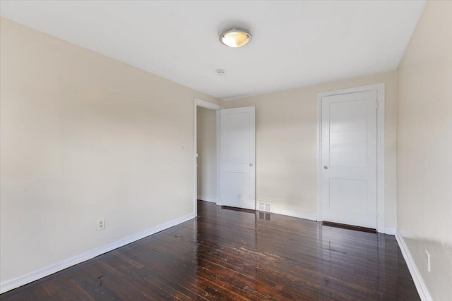 504 Alter Rd, Detroit, MI 48215 - spare room featuring wood-type flooring and baseboards