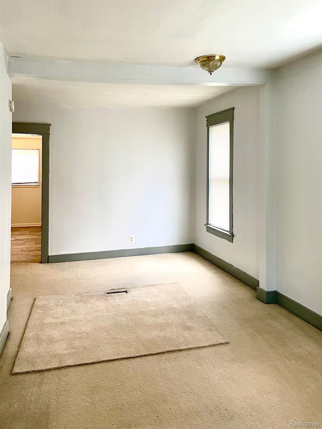 2373 S Dye Rd, Flint, MI 48532 - carpeted spare room featuring baseboards