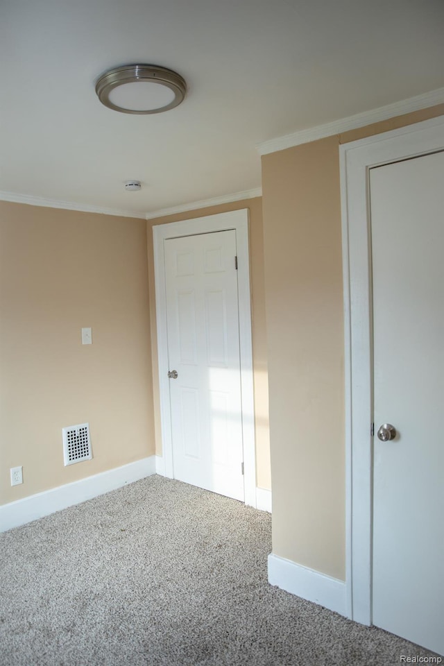 6052 Hartford St, Detroit, MI 48210 - unfurnished bedroom featuring baseboards, carpet floors, and ornamental molding