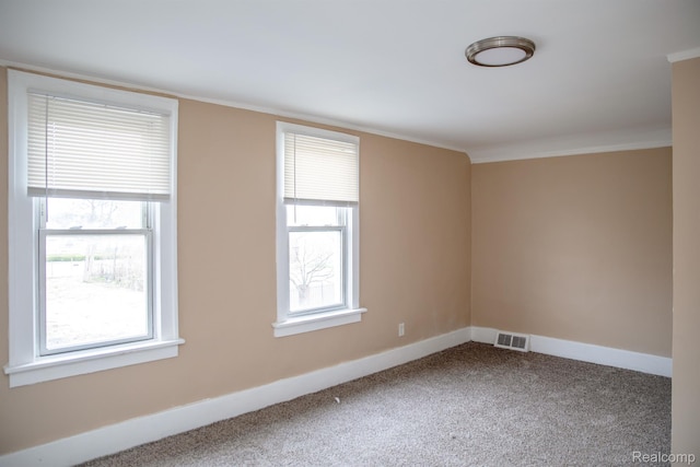 6052 Hartford St, Detroit, MI 48210 - carpeted spare room with ornamental molding and baseboards