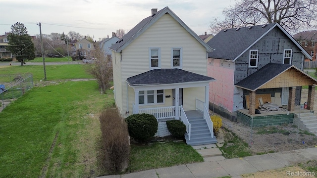 6052 Hartford St, Detroit, MI 48210 - view of front facade with covered porch, stairs, and a shingled roof