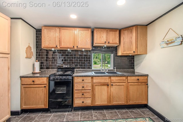 8515 Old State Ave, Farwell, MI 48622 - kitchen with black gas range oven, a sink, dark countertops, decorative backsplash, and recessed lighting