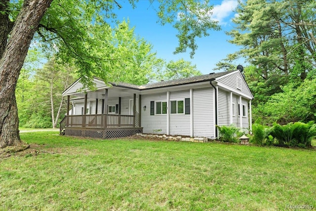 1060 Apple Blossom Dr, Howell, MI 48843 - ranch-style home with a front lawn and covered porch