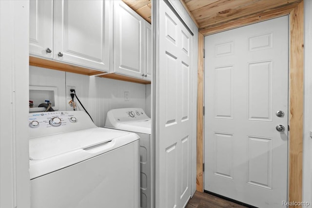 1060 Apple Blossom Dr, Howell, MI 48843 - washroom featuring cabinet space, washing machine and dryer, wood ceiling, and dark wood-style flooring