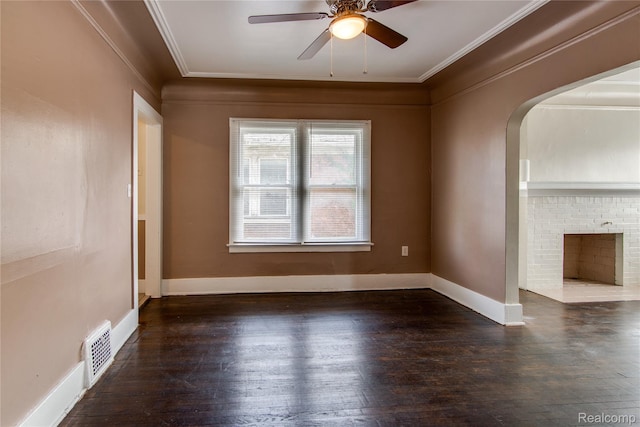 46 W Arizona St, Highland Park, MI 48203 - unfurnished living room with a ceiling fan, ornamental molding, wood finished floors, arched walkways, and baseboards