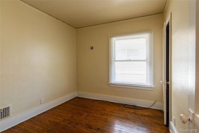 46 W Arizona St, Highland Park, MI 48203 - spare room featuring dark wood-style floors and baseboards