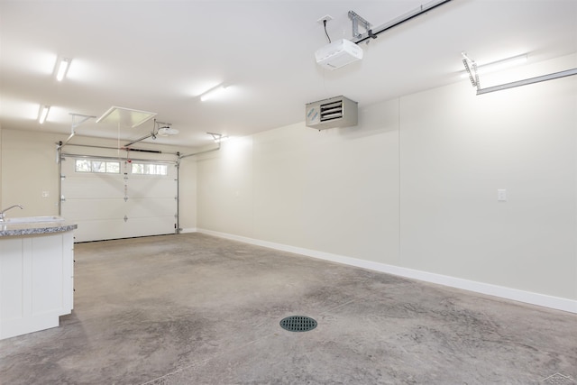 2291 E Maple Rd, Clare, MI 48617 - garage with a heating unit and a garage door opener