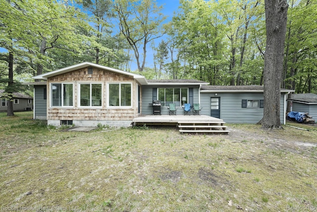 9689 Pine Ln, Evart, MI 49631 - back of property featuring a wooden deck