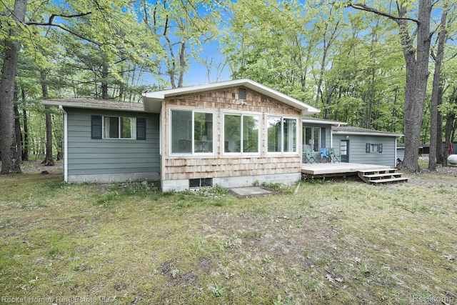 9689 Pine Ln, Evart, MI 49631 - view of front of property with a wooden deck