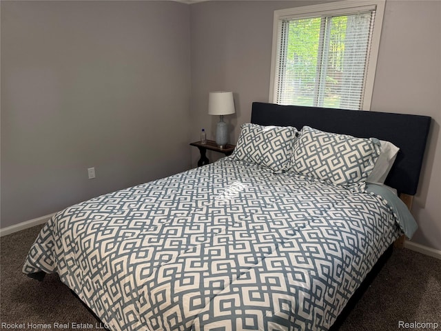 9689 Pine Ln, Evart, MI 49631 - carpeted bedroom featuring baseboards