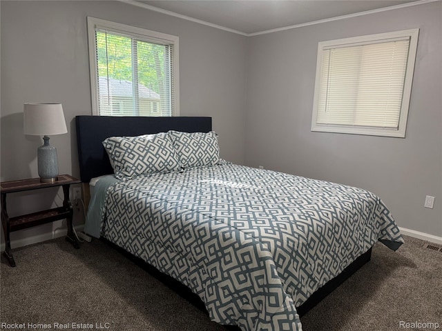 9689 Pine Ln, Evart, MI 49631 - carpeted bedroom featuring ornamental molding and baseboards