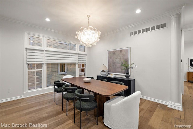 855 Wallace St, Birmingham, MI 48009 - dining area with a chandelier, ornamental molding, wood finished floors, baseboards, and recessed lighting