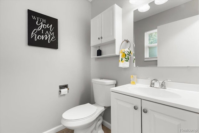 26080 Elba, Redford, MI 48239 - bathroom with toilet, vanity, and baseboards
