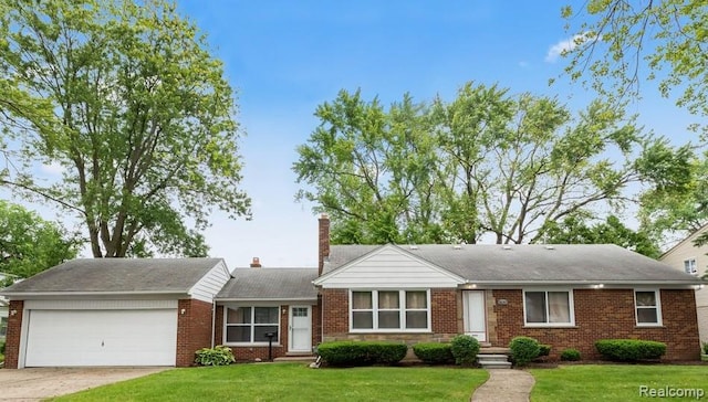 26080 Elba, Redford, MI 48239 - ranch-style house with an attached garage, brick siding, driveway, and a front lawn