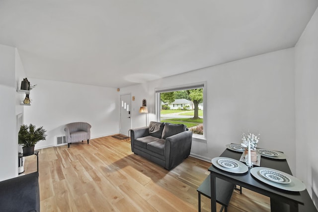 801 Briarcliff Rd, Jackson, MI 49203 - living room featuring wood finished floors and baseboards