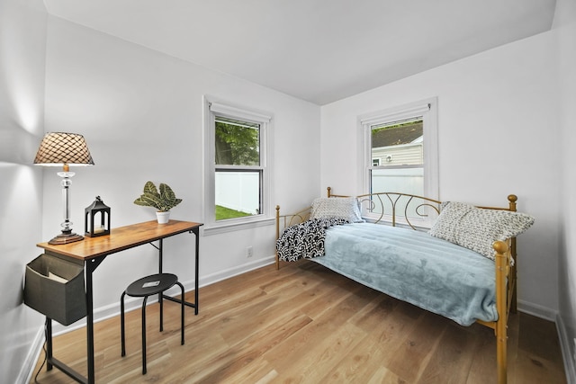801 Briarcliff Rd, Jackson, MI 49203 - bedroom with baseboards and light wood finished floors