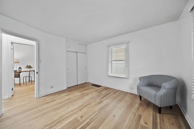801 Briarcliff Rd, Jackson, MI 49203 - sitting room featuring light wood-style flooring and baseboards