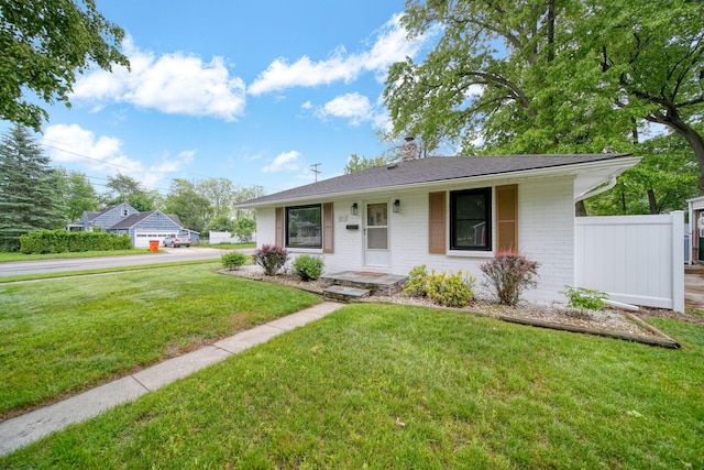 801 Briarcliff Rd, Jackson, MI 49203 - view of front of property featuring brick siding and a chimney
