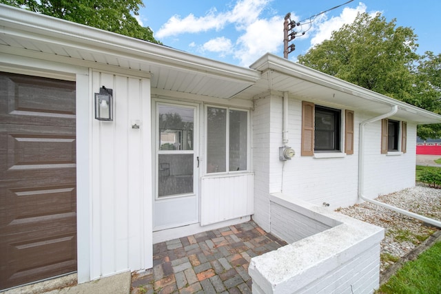 801 Briarcliff Rd, Jackson, MI 49203 - view of exterior entry featuring brick siding