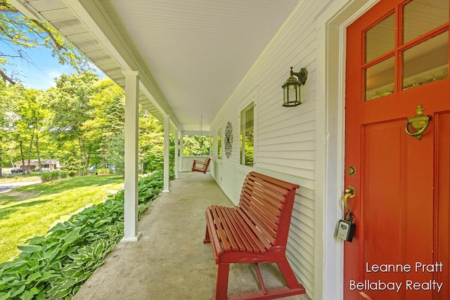13814 28th St, Lowell, MI 49331 - covered porch with a yard