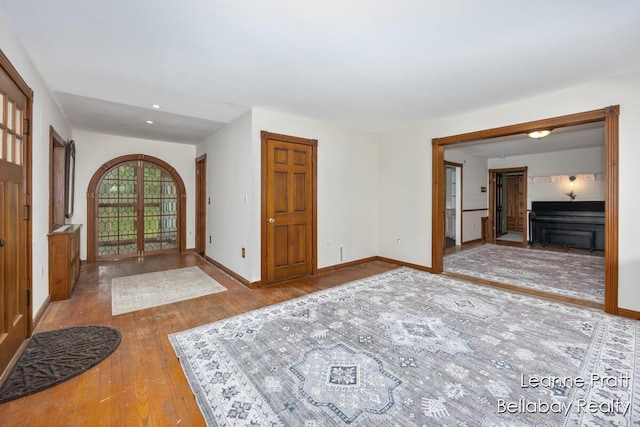 13814 28th St, Lowell, MI 49331 - entrance foyer featuring wood-type flooring and baseboards