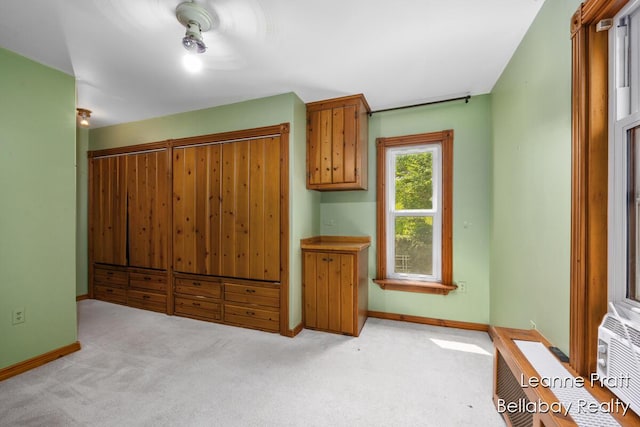 13814 28th St, Lowell, MI 49331 - unfurnished bedroom with light colored carpet and baseboards