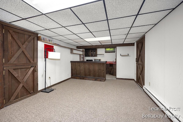 13814 28th St, Lowell, MI 49331 - bar featuring a baseboard heating unit, light colored carpet, baseboards, and a drop ceiling